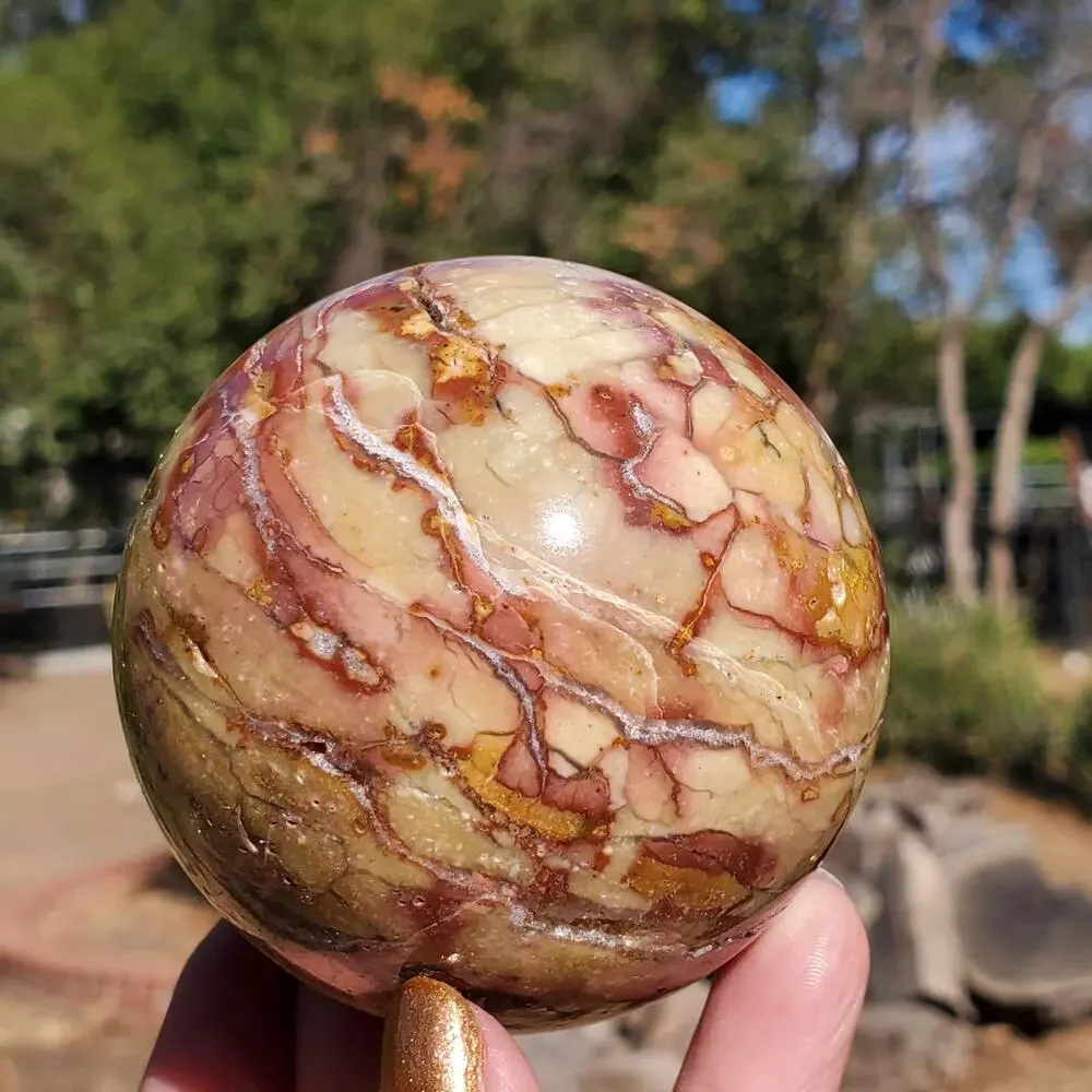 Pink Ocean Ibis Jasper Brecciated Sphere w/ Caves Druzy 458 grams 71mm